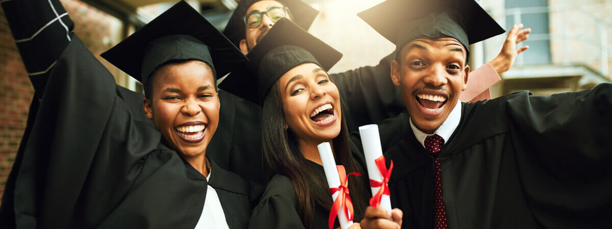 Students celebrating graduating